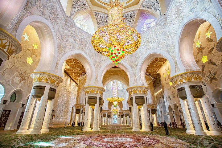 Experience the grandeur of the Sheikh Zayed Grand Mosque with its stunning architecture and intricate details all while riding in luxury to Abu Dhabi from Dubai. Capture unforgettable moments along the way.